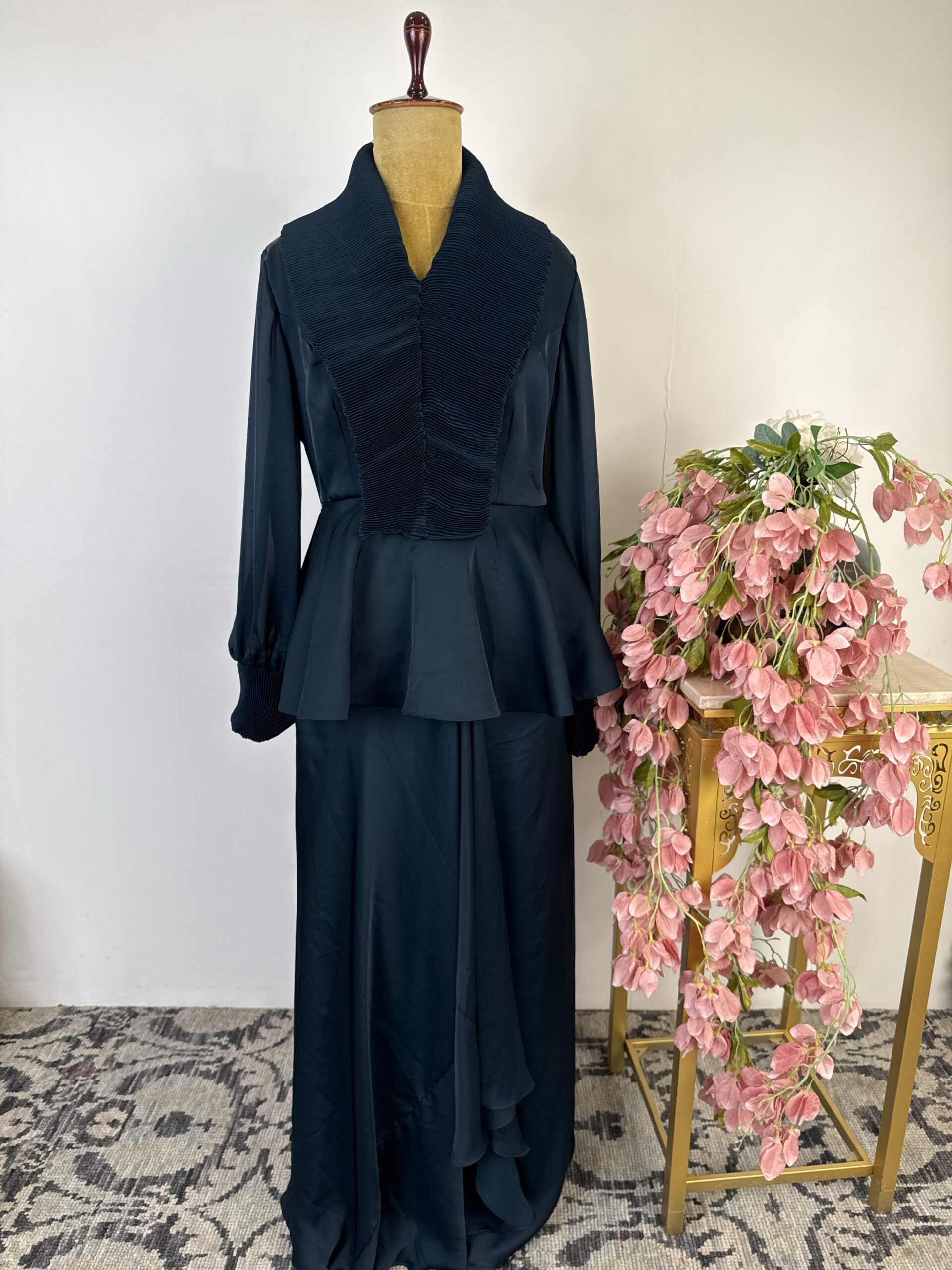 Navy blue colour peplum top with drape skirt