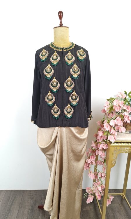Black top with gold drape skirt