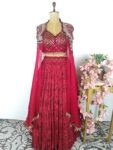 Red colour corset and skirt with cape