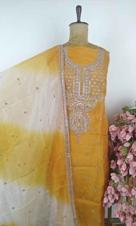 Yellow organza unstitched suit