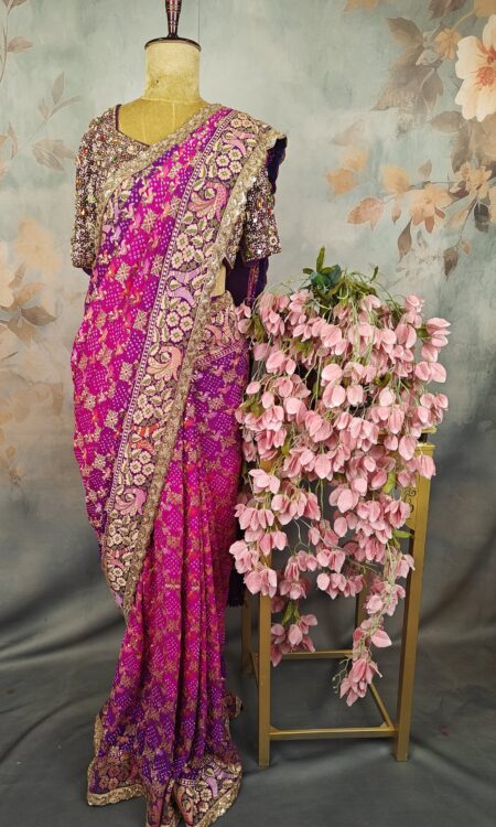 Rich fuchsia pink and deep purple, accented with antique gold and earthy multicolour details.