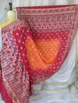Red to Orange Bandhani Pilya Dupatta with Raja Rani Motifs